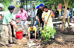 SOI activists clean the premises at Panjab University on Wednesday