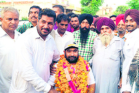 Rajinder Singh Rahelu was given warm welcome by his villagers at Phillaur near Jalandhar.