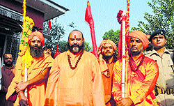 A group of sadhus, led by Mahant Dependra Giri (centre), carries the Charri Mubarak from Srinagar to the Amarnath shrine on Wednesday