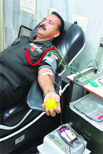 JCO Suresh Saini donates blood in Rajasthan on Wednesday.