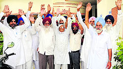 Families of the freedom fightes families shout slogans in supports of their demands during a meeting in Bathinda on Thursday