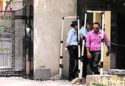A man passes through a metal detector at Governement Rajindra College in Bathinda on Thursday