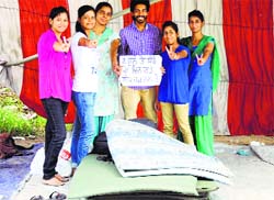 GADVASU students show victory sign after ending their protest in Ludhiana on Thursday. Tribune photo: Himanshu Mahajan