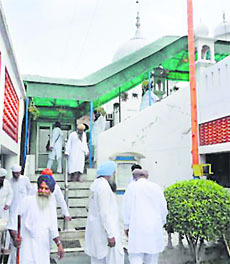 Devotees at the Cheeka gurdwara.