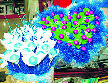 The markets are flooded with chocolate candy gift baskets in Amritsar on Friday