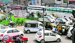 Luxury coach buses parked outside Hall Gate hamper the smooth flow of traffic in Amritsar on Friday