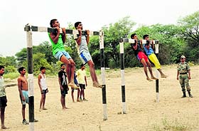 Candidates participate in drills to showcase strength.