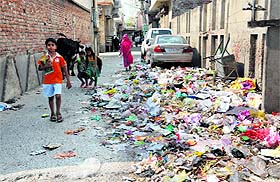a heap of garbage at the Nai Basti area in Bathinda on Friday.
