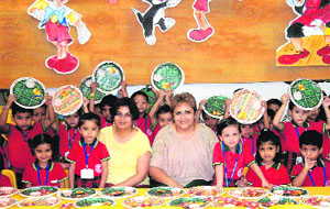 Students of Tribune Model School during a rakhi-making contest in Chandigarh. 