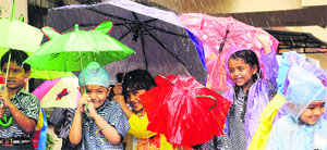 Children have fun during a monsoon party at Doon International School in Mohali on Friday.