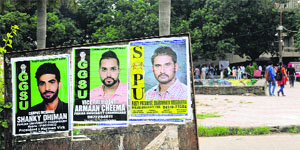 Posters seeking support for students in the fray for the Panjab University Campus Student Council seats don a signboard on the campus. The UT SSP took a serious note of defacement of public property.