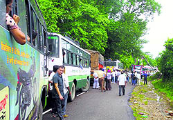 An uprooted electric pole disrupts traffic on the Dharamsala-Hoshiarpur National Highway near Dehra in Kangra