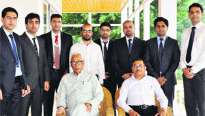 Governor NN Vohra with civil services examination qualifiers in Srinagar on Friday.