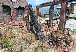 A shop which was set on fire by rioters in Kishtwar on August 9, 2013. 