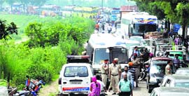 Vehicles stuck in a traffic jam on National Highway-1.