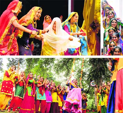 Girls dressed in traditional Punjabi attire celebrate Teej at the Khalsa College for Women in Ludhiana.