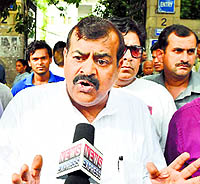 Phoolan Devis husband Umaid Singh talks to the media outside Patiala House court in New Delhi on Friday