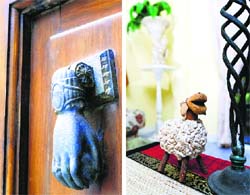 Door knockers and unique accessories jazz up theentryway decor