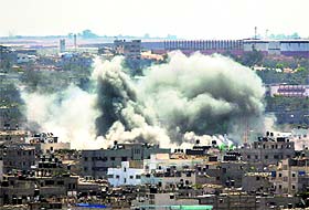 Smoke rises over Gaza City after an Israeli strike on Friday.