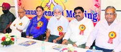 Members of the Focal Point Industrial Welfare Association at the annual general house meeting in Amritsar on Saturday. A Tribune Photograph