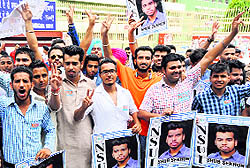 Shubh Sekho (in off-white kurta pyjama) flanked by his supporters