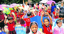 Children enjoy artificial rain at Tribune Model School, Sector 29, Chandigarh, on Saturday