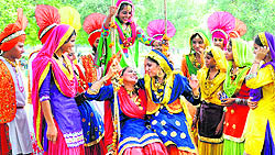 Artistes enjoy swing during Teej celebrations at the Shivalik Garden in Mani Majra on Saturday