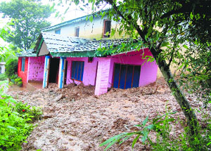 A damaged house at Chola village near Dharamsala on Saturday.