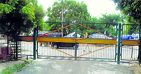 The locked gate of Shaheed Bhagat Singh Nagar Colony in Ludhiana.