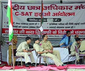 The Delhi Police personnel take some rest under a tent where the UPSC aspirants sit on dharna against C-SAT. Just few students are left to continue the protest at Jantar Mantar in New Delhi on Sunday.
