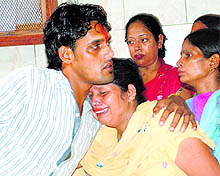 Sister of an inmate of Ambala Central Jail gets emotional after tying rakhi to her brother on Sunday