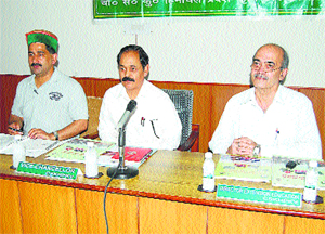 Dr KK Katoch (centre), VC, CSKHPKV, KS Pathania, Vice-Chairman, Forest Corporation, and Dr Atul, Director, Extension Education, at a meeting at KVK in Kangra on Saturday.