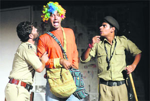 Artistes perform in a play Ek Hadsa organised by Yuva Theatre at Desh Bhagat Yadgar Hall in Jalandhar.