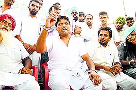 Balkar Sidhu addresses the media in Talwandi Sabo on Sunday.