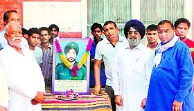 Tributes being paid to martyr Capt Navpal Singh Sidhu  in Sriganganagar; and (above) the neglected project. Tribune photos