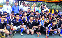 Players of Army Public School after winning the Uttrakhand Sub Area Football Tournament at the Mahindra Ground in Dehradun on Sunday