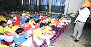 A cyber expert interacts with students at St Johns School, Sector 26, Chandigarh, on Monday.