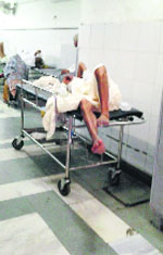 The victim lies on a trolley at the PGI on Monday. 