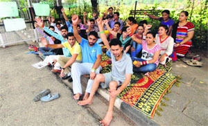 INSO workers hold a protest outside the Vice-Chancellor's office at Panjab University on Monday. 