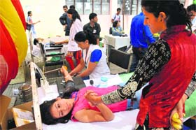 Students donate blood at a camp on the occasion of the 26th Martyr Day of Late Nasir Khan. The camp was organised by the NSUI at HPU in Shimla on Monday.