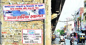 A banner put up by the shopkeepers of the Old Railway Road against MC authorities in Jalandhar on Monday. 