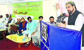 Moderate Hurriyat chairman Mirwaiz Umar Farooq addresses a seminar in Srinagar on Monday.