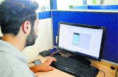 A youth develops mobile apps at a city-based company.