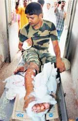 An injured BSF constable being taken to the Government Medical College and Hospital in Jammu.