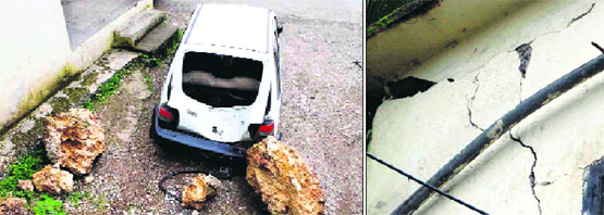 A vehicle belonging to Fire Department officials that was damaged due to the falling of boulders recently; and (right) cracks on a wall of the fire station in Mussoorie