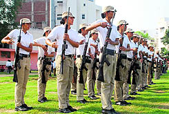 Punjab police personnel take part in a parade at Guru Nanak Dev Stadium in Amritsar on Tuesday