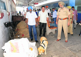 The railway police perform security checks in trains ahead of the Independence Day in Bathinda on Tuesday