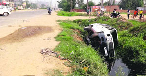 The Tata Qualis that overturned after knocking down a cyclist on the Kalka-Ambala highway on Tuesday.