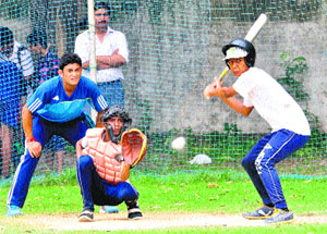 Players of the GMSSS -33 and GMSSS-39 in action during the inter-school baseball championship at the GMSSS-35, Chandigarh, on Tuesday.
