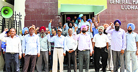 BSNL employees shout slogans at Bharat Nagar Chowk in Ludhiana on Tuesday. 